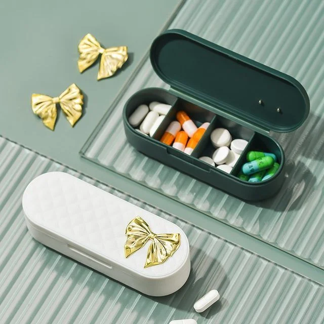 Bow Plastic Pill Box by Evora