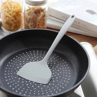 Colored Cooking Spoon by Iswas