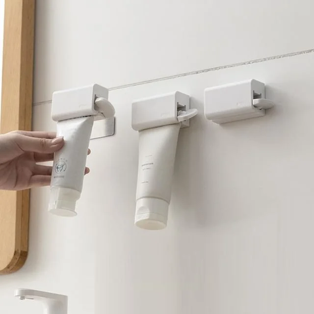 Magnetic / Clip On Adhesive Toothbrush Squeezer by Home Simply